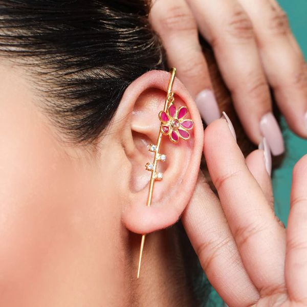 https://akm-img-a-in.tosshub.com/lingo/brt/images/photo_gallery/202509/unniyarcha_rs_6312_silver_flower_earcuff.jpg