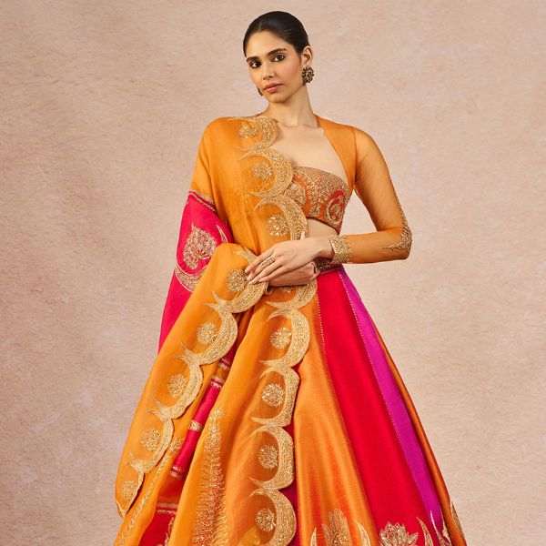 https://akm-img-a-in.tosshub.com/lingo/brt/images/photo_gallery/202510/masaba_orange_silk_net_organza_embroidery_stones_patakha_12_kalis_lehenga_set_rs425000_0.jpg