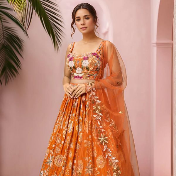 https://akm-img-a-in.tosshub.com/lingo/brt/images/photo_gallery/202510/samyukta_singhania_orange_crepe_chiffon_pearls_sequins_beads_floral_embroidered_lehenga_set_rs39200.jpg
