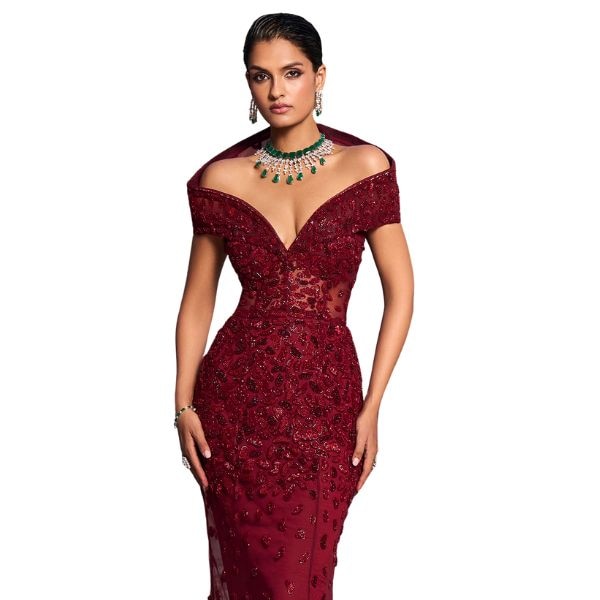 https://akm-img-a-in.tosshub.com/lingo/brt/images/photo_gallery/202511/amit_gt_burgundy_tulle_embroidery_sequins_off-shoulder_sweetheart_ingrid_rouge_gown_rs153000.jpg