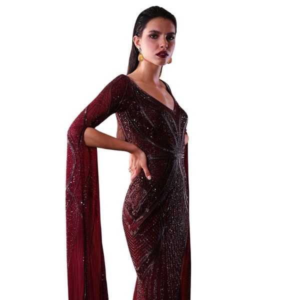 https://akm-img-a-in.tosshub.com/lingo/brt/images/photo_gallery/202511/bhawna_rao_red_silk_tulle_beads_sequins_cut_work_asymmetric_and_hand_embroidered_gown_rs147340.jpg