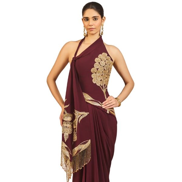 https://akm-img-a-in.tosshub.com/lingo/brt/images/photo_gallery/202511/masaba_burgundy_crepe_embroidery_crystals_tassels_kareeb_se_draped_corset_skirt_rs95000.jpg