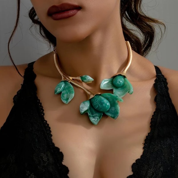 https://akm-img-a-in.tosshub.com/lingo/brt/images/photo_gallery/202512/bling_queen_bohemian_resin_magnolia_flower_pendant_necklace_rs2599.png