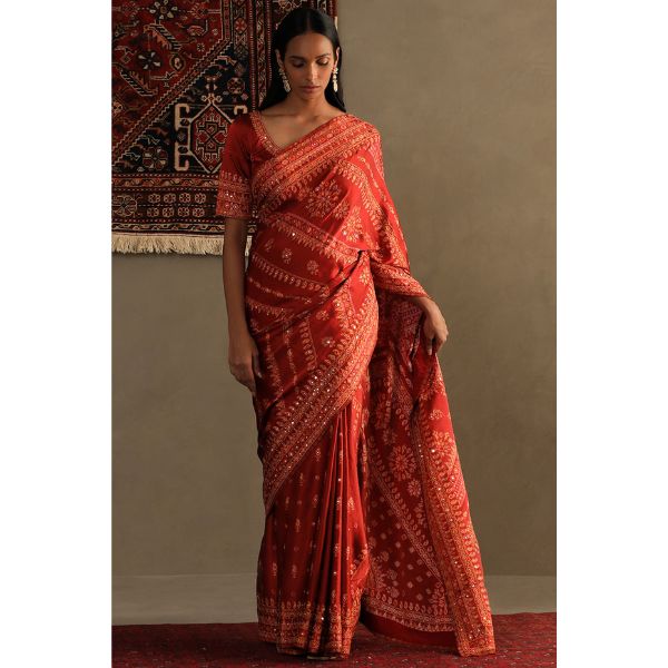 https://akm-img-a-in.tosshub.com/lingo/brt/images/photo_gallery/202512/ri_ritu_kumar_wishlist_lava_red_silk_satin_geometric_printed_kashida_embroidered_saree_set_125000.jpg