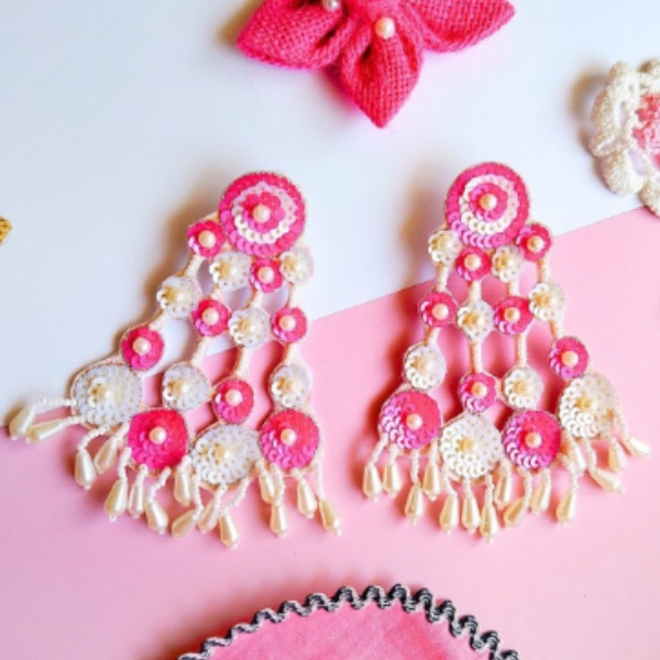 https://akm-img-a-in.tosshub.com/lingo/brt/images/photo_gallery/202512/sangria_beaded_earrings_rs2396.png