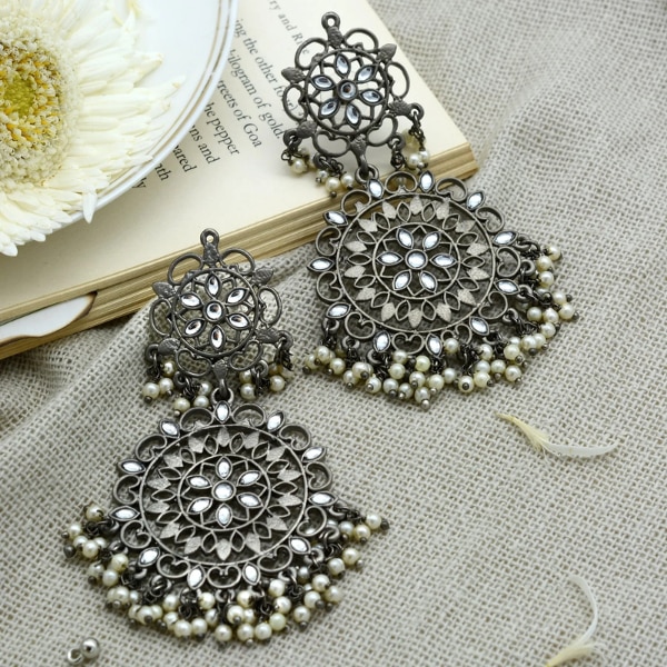 https://akm-img-a-in.tosshub.com/lingo/brt/images/photo_gallery/202512/teejh_swati_silver_oxidized_filigree_statement_earrings_rs2899.png