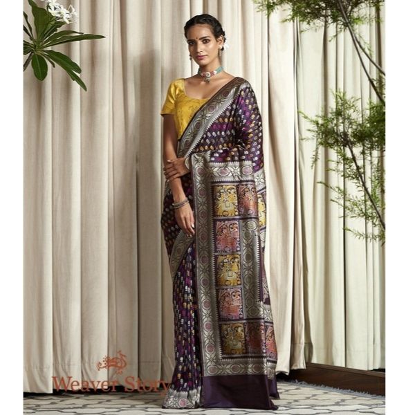 https://akm-img-a-in.tosshub.com/lingo/brt/images/photo_gallery/202512/weaver_story_handwoven_banarasi_baluchari_saree_in_dark_purple_with_elephant_pallu_71990.jpg