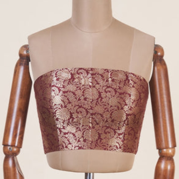 https://akm-img-a-in.tosshub.com/lingo/brt/images/photo_gallery/202601/dressfolk_crimson_corset_rs6200.png