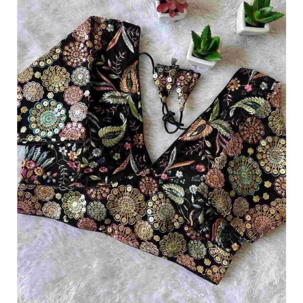 https://akm-img-a-in.tosshub.com/lingo/brt/images/photo_gallery/202601/isadora_life_black_georgette_rangoli_embroidered_blouse_rs2288.png