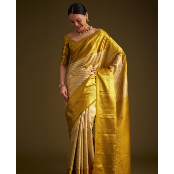 https://akm-img-a-in.tosshub.com/lingo/brt/images/photo_gallery/202601/kalki_gold_kanjivaram_silk_saree_with_zari_border_rs28495.png