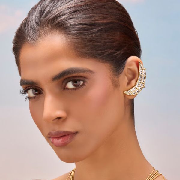 https://akm-img-a-in.tosshub.com/lingo/brt/images/photo_gallery/202601/mnsh_gold_plated_stones_chaand_polki_earcuff_rs5800.jpg