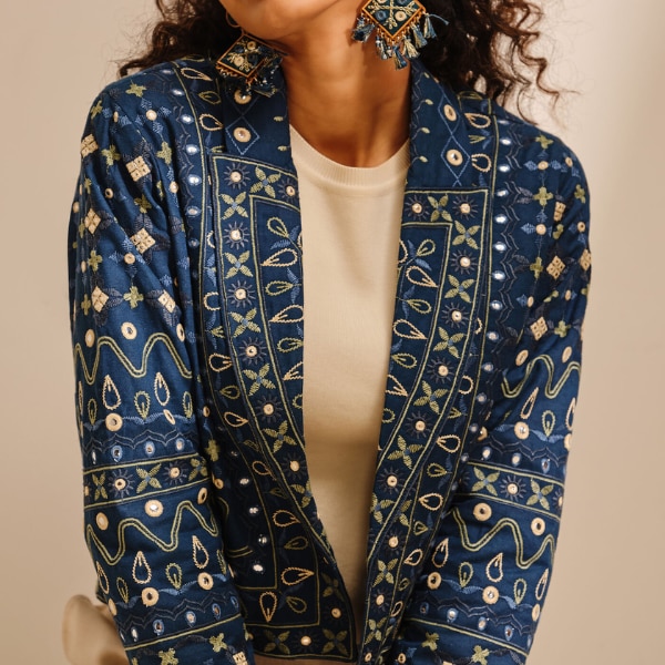 https://akm-img-a-in.tosshub.com/lingo/brt/images/photo_gallery/202602/global_desi_indigo_mirrorwork_embroidered_jacket_rs6990.png