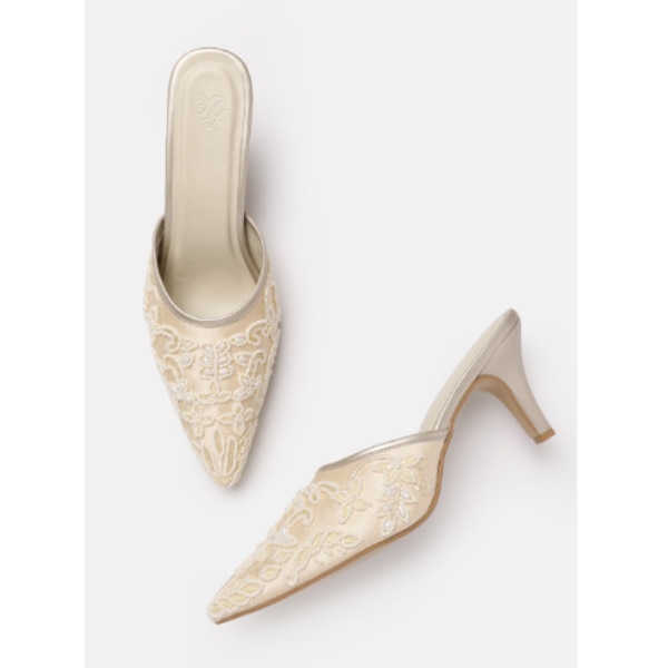 https://akm-img-a-in.tosshub.com/lingo/brt/images/photo_gallery/202602/house_of_pataudi_beaded_embellished_slim_heeled_mules_rs4299.png