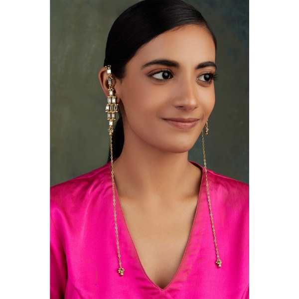https://akm-img-a-in.tosshub.com/lingo/brt/images/photo_gallery/202602/house_of_tuhina_gold_plated_mirrors_studded_falak_dejhoor_earrings_rs3950.png