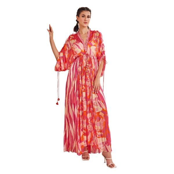 https://akm-img-a-in.tosshub.com/lingo/brt/images/photo_gallery/202602/mandira_wirk_red_chiffon_polyester_tassels_ruffles_v-neck_pleated_and_printed_kaftan_rs31800.jpg