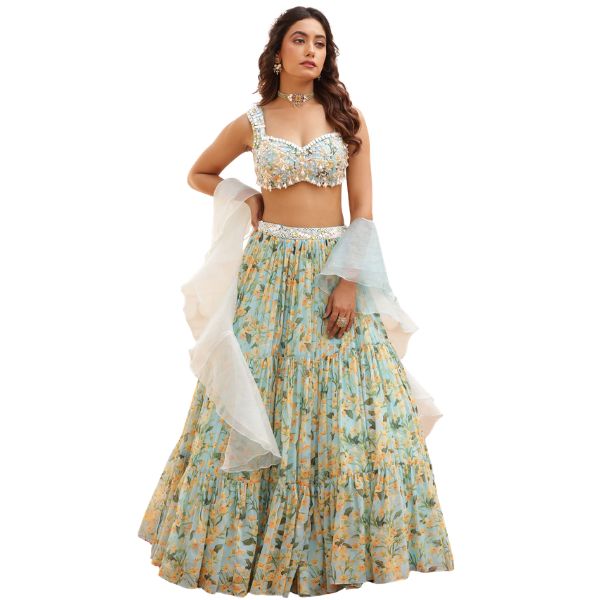 https://akm-img-a-in.tosshub.com/lingo/brt/images/photo_gallery/202602/manisha_soni_couture_blue_chiffon_organza_pearls_sequins_floral_print_tiered_lehenga_blouse_set_rs38000.jpg