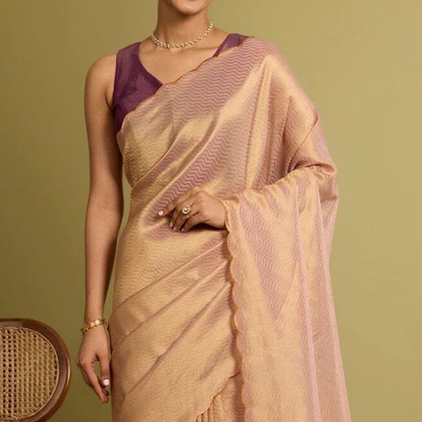 https://akm-img-a-in.tosshub.com/lingo/brt/images/photo_gallery/202602/taneira_pink_chattisgarh_woven_pure_tussar_silk_saree_rs9499.png