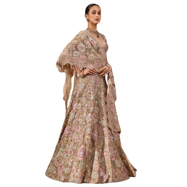 https://akm-img-a-in.tosshub.com/lingo/brt/images/photo_gallery/202602/tarun_tahiliani_multi_color_tulle_sequins_beads_embroidery_floral_lehenga_saree_set_rs953894.jpg