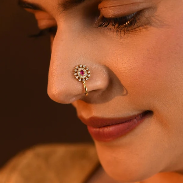 https://akm-img-a-in.tosshub.com/lingo/brt/images/photo_gallery/202602/totapari_rose_radiance_cz_gold_plated_silver_nose_pin_rs2050.png