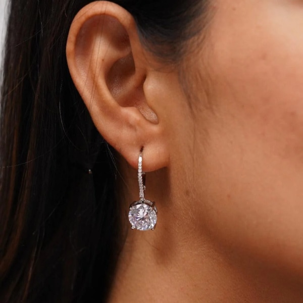 https://akm-img-a-in.tosshub.com/lingo/brt/images/photo_gallery/202603/attrangi_5_carat_round_solitaire_diamond_bali_earrings_rs2150.png