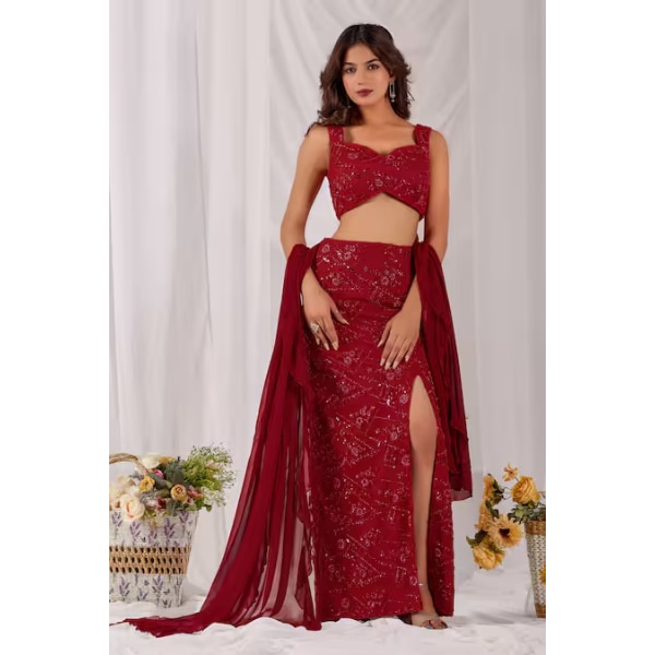 https://akm-img-a-in.tosshub.com/lingo/brt/images/photo_gallery/202603/damoiselle_red_net_shantoon_gulzaar_embroidered_pencil_skirt_set_rs19200_0.png
