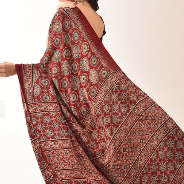 https://akm-img-a-in.tosshub.com/lingo/brt/images/photo_gallery/202603/jaypore_red_modal_ajrakh_printed_saree_rs9890.png