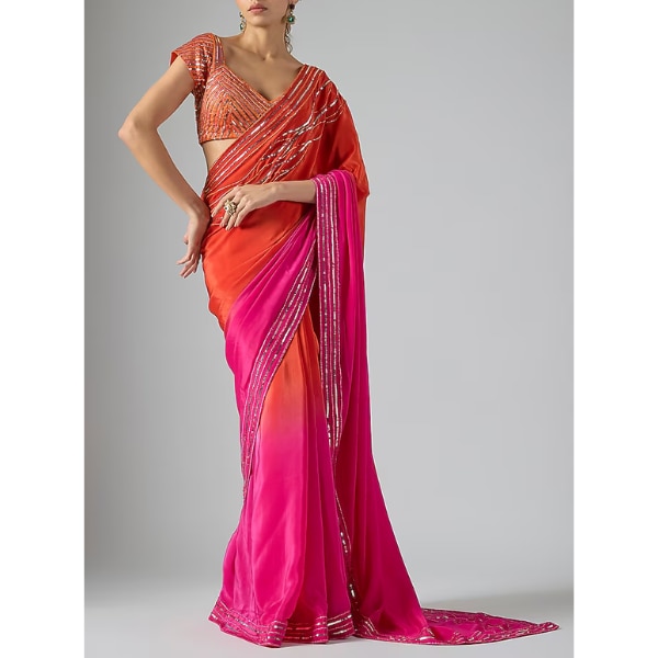https://akm-img-a-in.tosshub.com/lingo/brt/images/photo_gallery/202603/masumi_mewawalla_hot_pink_orange_ombre_natural_crepe_aari_embroidered_saree_set_rs48500.png