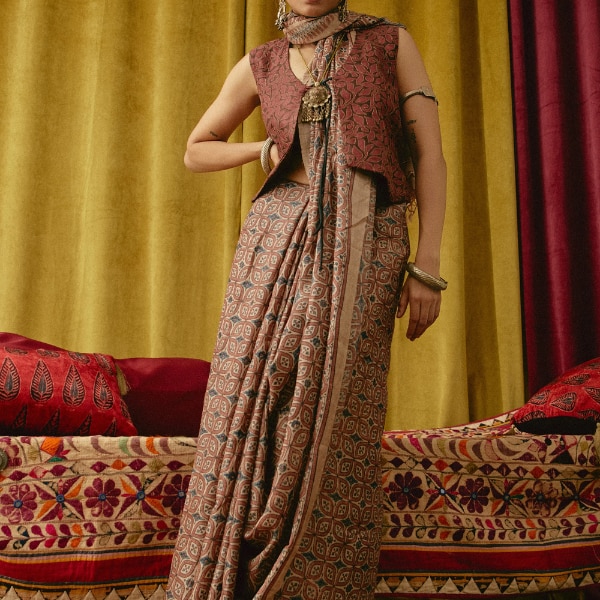 https://akm-img-a-in.tosshub.com/lingo/brt/images/photo_gallery/202603/tuti_kharek_pencho_ajrakh_saree_rs13199.png