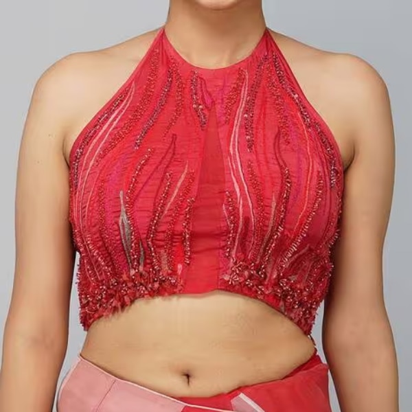 https://akm-img-a-in.tosshub.com/lingo/brt/images/photo_gallery/202603/yavi_embellished_blouse_with_tie-up_rs23500.png