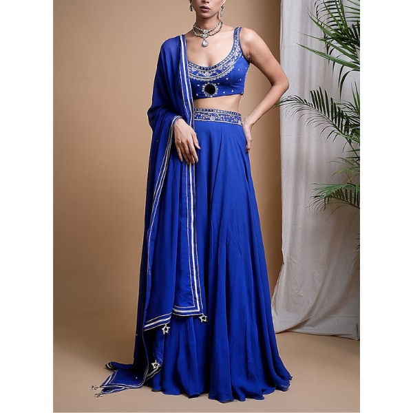 https://akm-img-a-in.tosshub.com/lingo/brt/images/photo_gallery/202604/ahi_clothing_royal_blue_heavy_georgette_embroidered_lehenga_set_rs36995.png