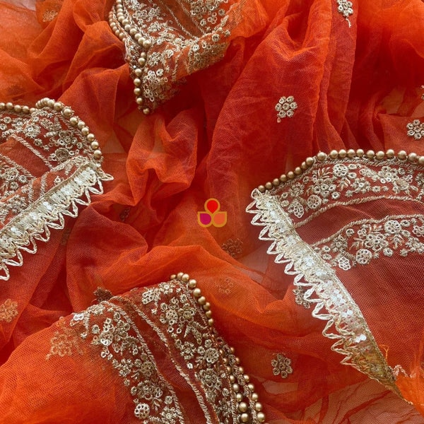 https://akm-img-a-in.tosshub.com/lingo/brt/images/photo_gallery/202604/anokherang_rust_sequin_zari_scalloped_net_dupatta_rs2499.png