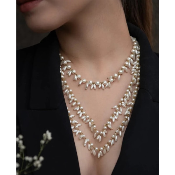 https://akm-img-a-in.tosshub.com/lingo/brt/images/photo_gallery/202604/binni_tranquil_tides_pearl_necklace_rs7998.png