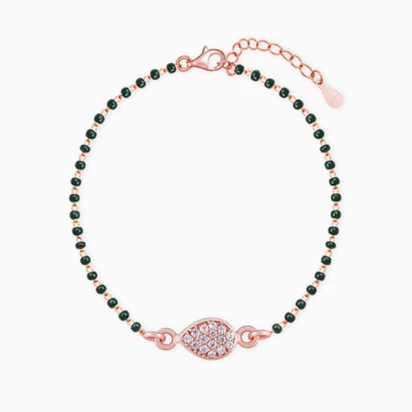 https://akm-img-a-in.tosshub.com/lingo/brt/images/photo_gallery/202604/giva_rose_gold_tears_of_love_mangalsutra_bracelet_rs5299.png