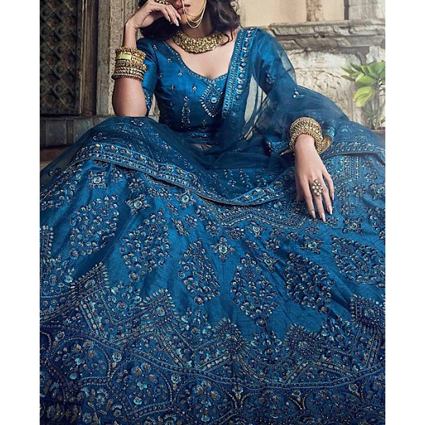 https://akm-img-a-in.tosshub.com/lingo/brt/images/photo_gallery/202604/mor_sons_cobalt_blue_lehenga_choli_crafted_with_aplique_stone_embroidery_rs18814.png