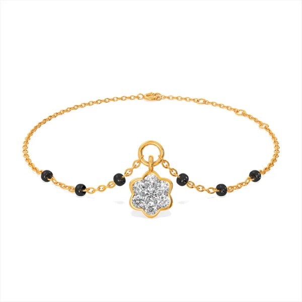 https://akm-img-a-in.tosshub.com/lingo/brt/images/photo_gallery/202604/palmonas_stella_9kt_gold_laboratory_grown_diamond_mangalsutra_bracelet_rs20482.png