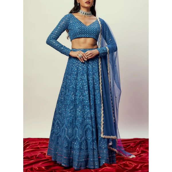 https://akm-img-a-in.tosshub.com/lingo/brt/images/photo_gallery/202604/renee_label_cobalt_blue_threadwork_lehenga_set_rs43890.png