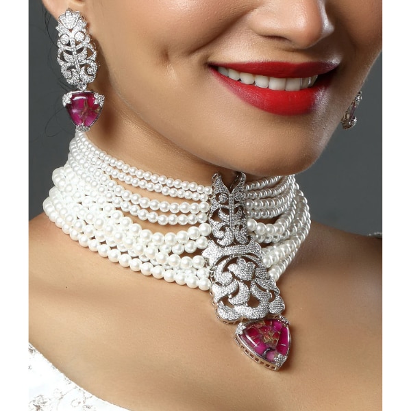 https://akm-img-a-in.tosshub.com/lingo/brt/images/photo_gallery/202604/shelly_jewels_beautiful_white_pearl_statement_choker_necklace_rs12500.png