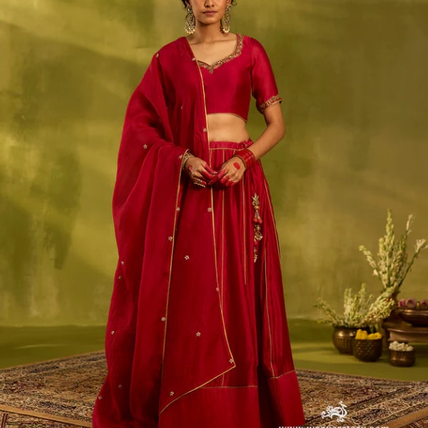https://akm-img-a-in.tosshub.com/lingo/brt/images/photo_gallery/202604/weaverstory_brick_red_handloom_chanderi_lehenga_rs48990.png
