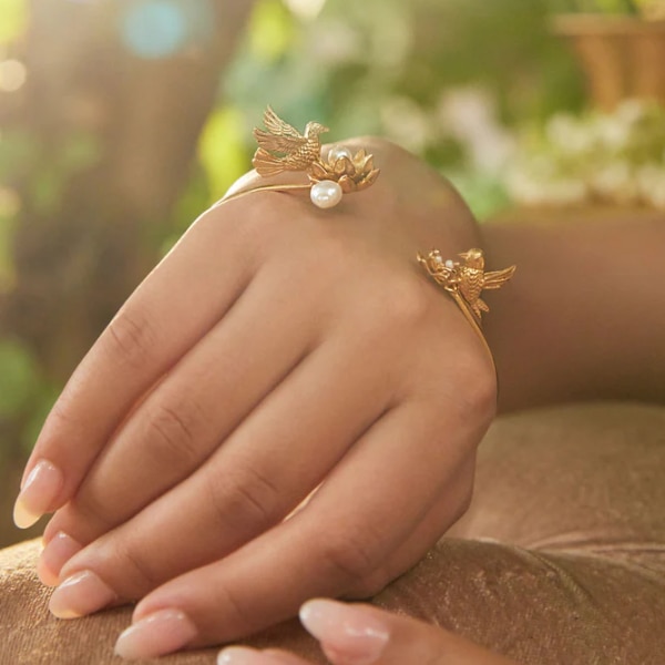 https://akm-img-a-in.tosshub.com/lingo/brt/images/photo_gallery/202605/amama_parishri_udatee_chidiya_palm_cuff_rs3999.png
