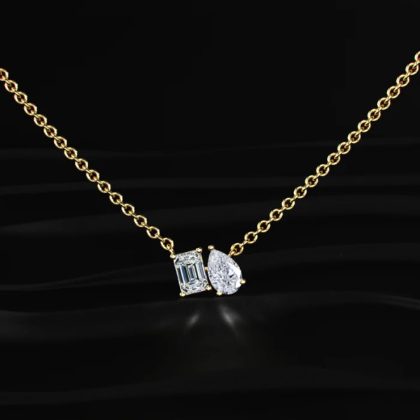 https://akm-img-a-in.tosshub.com/lingo/brt/images/photo_gallery/202605/earthly_jewels_toi_et_moi_emerald_and_pear_necklace_rs43320.png