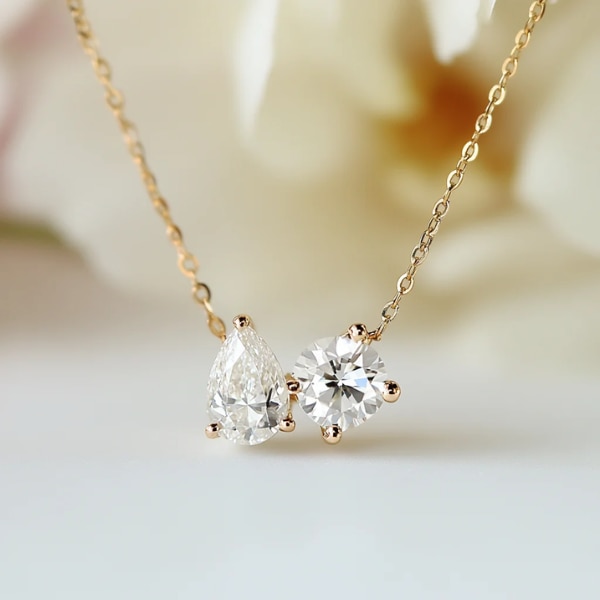https://akm-img-a-in.tosshub.com/lingo/brt/images/photo_gallery/202605/fiona_diamonds_ilara_lab_diamond_toi_et_moi_pendant_rs62931.png