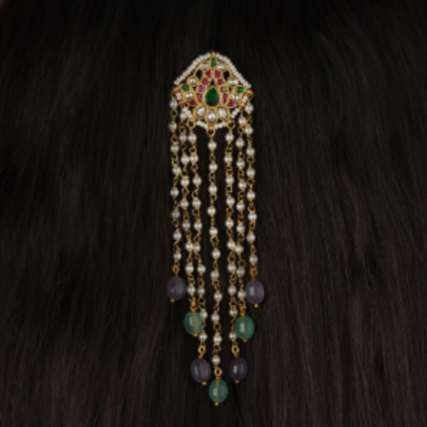 https://akm-img-a-in.tosshub.com/lingo/brt/images/photo_gallery/202605/mortantra_gold_plated_jadau_kundan_braid_accessories_rs3000.png