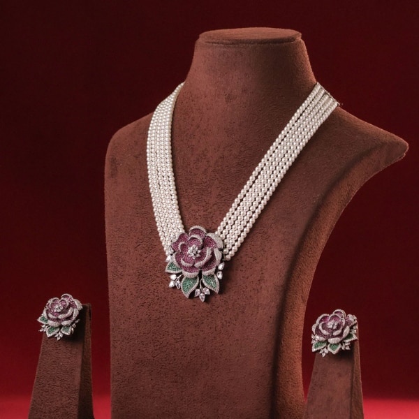 https://akm-img-a-in.tosshub.com/lingo/brt/images/photo_gallery/202605/mr_jewels_sovereign_rosette_pearl_necklace_set_rs28500.png