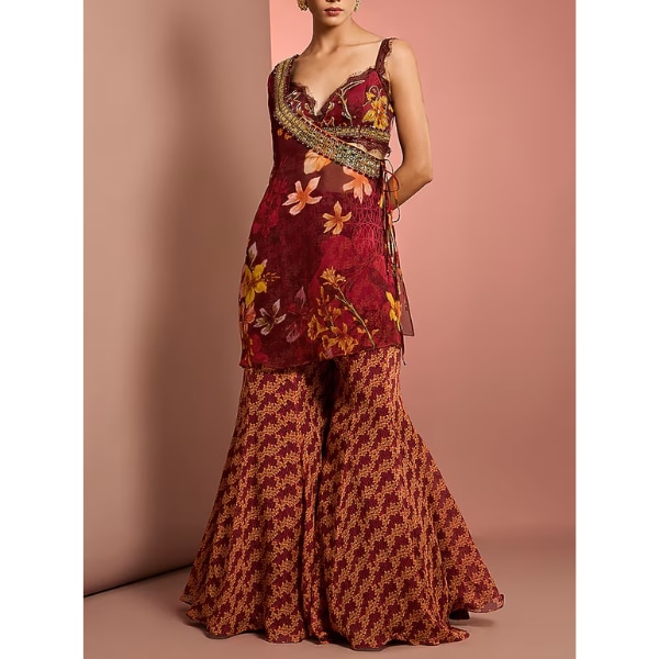 https://akm-img-a-in.tosshub.com/lingo/brt/images/photo_gallery/202605/neha_khullar_red_viscose_organza_floral_printed_sharara_set_rs38000.png
