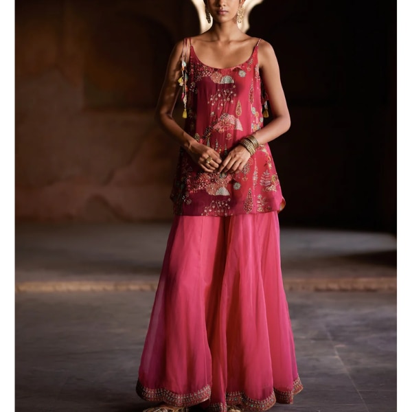 https://akm-img-a-in.tosshub.com/lingo/brt/images/photo_gallery/202605/rajiramniq_nadira_magenta_sharara_set_rs58800.png