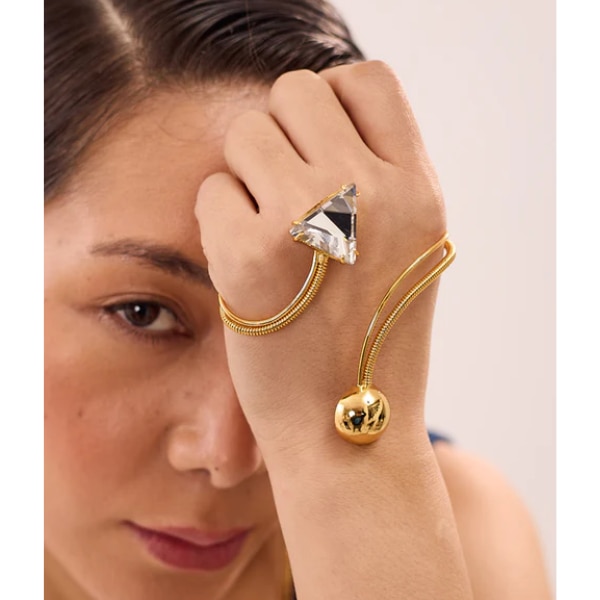 https://akm-img-a-in.tosshub.com/lingo/brt/images/photo_gallery/202605/ruhheite_iris_gemstone_palm_cuff_rs4200.png