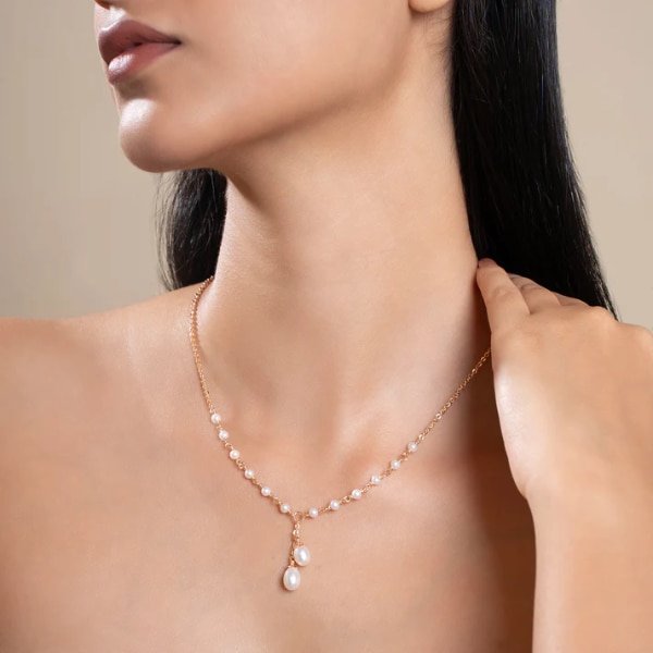 https://akm-img-a-in.tosshub.com/lingo/brt/images/photo_gallery/202605/the_pearl_story_whispering_twin_pearl_necklace_rs17746.png