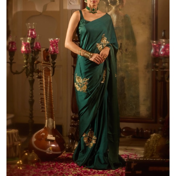 https://akm-img-a-in.tosshub.com/lingo/brt/images/photo_gallery/202606/aachho_yaadgaar_green_handcrafted_satin_saree_rs14591.png