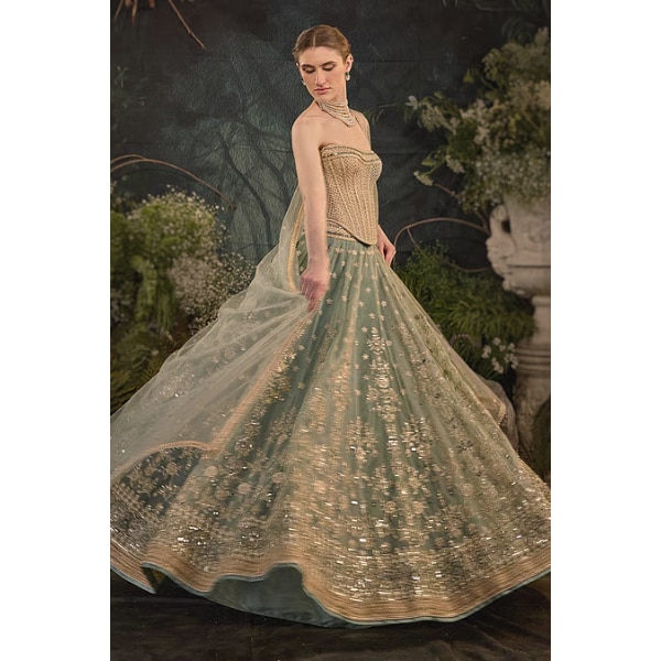 https://akm-img-a-in.tosshub.com/lingo/brt/images/photo_gallery/202606/cedar_pine_bandeau_ursula_lehenga_set_rs65000.png