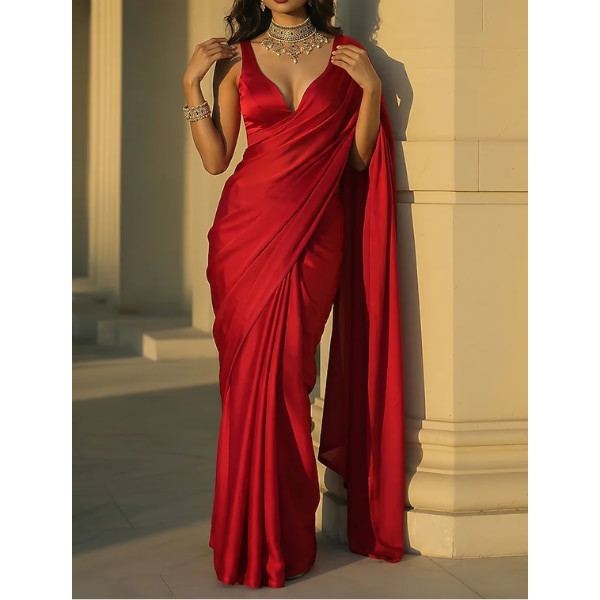 https://akm-img-a-in.tosshub.com/lingo/brt/images/photo_gallery/202606/phatakaa_red_satin_saree_set_rs18000.png